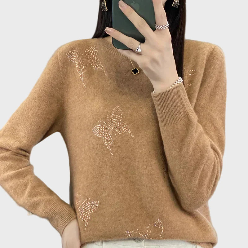 Pletený rolák s motívom motýľa